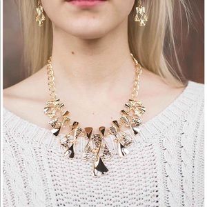 Gold necklace with matching earrings